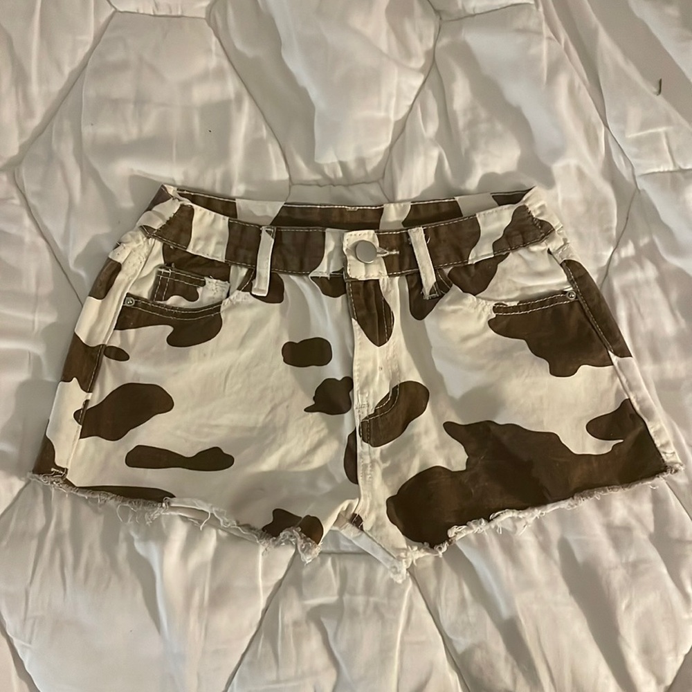 Cow print jean shorts